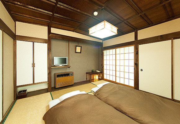 A Japanese-style 8-mat room with a bathroom